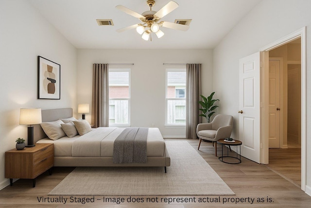 1026 Jasons Bend Dr, Sugar Land, TX 77479 - bedroom featuring light wood finished floors, baseboards, and ceiling fan