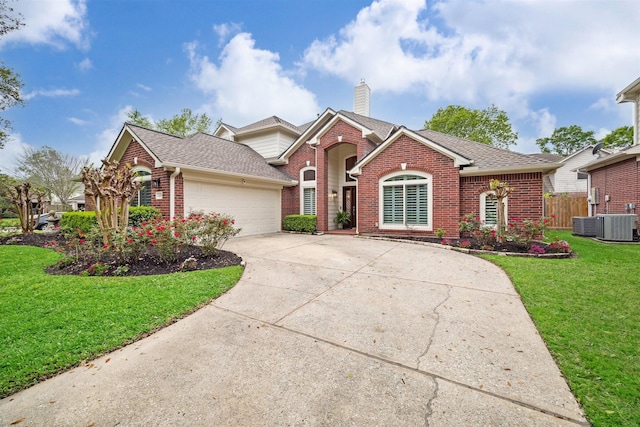 14718 Kings Head Dr, Houston, TX 77044 - ranch-style home with brick siding, a garage, a front lawn, and driveway