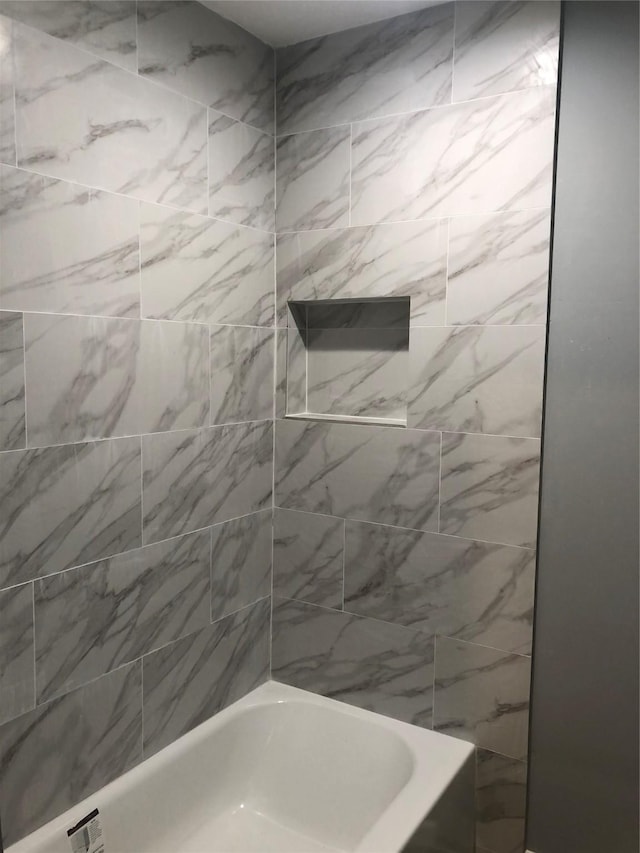 full bathroom with washtub / shower combination