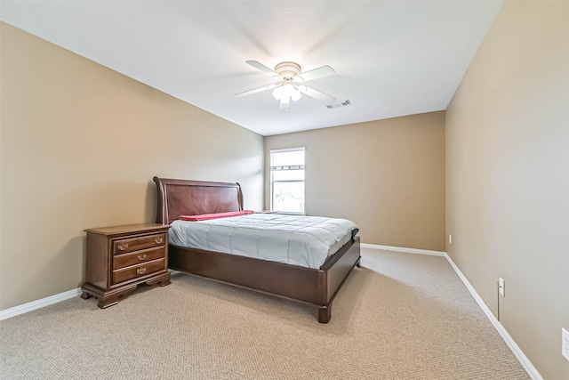 bedroom featuring baseboards, a ceiling fan, light colored carpet, and visible vents
