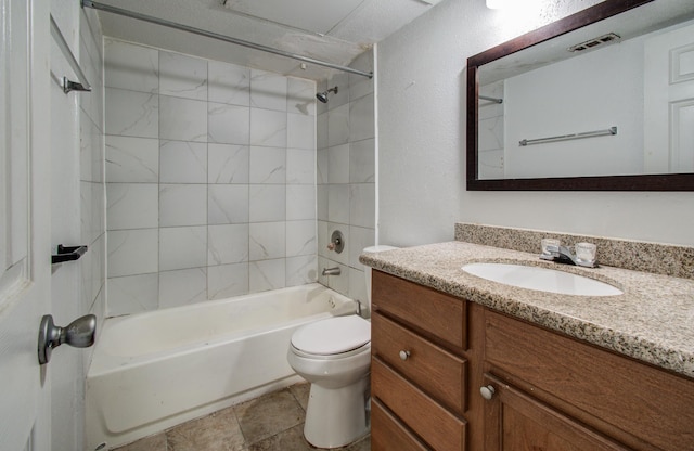 full bath featuring shower / bath combination, vanity, toilet, and visible vents