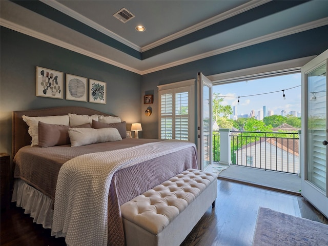 228 E Woodland St, Houston, TX 77009 - bedroom with wood finished floors, ornamental molding, visible vents, recessed lighting, and access to exterior