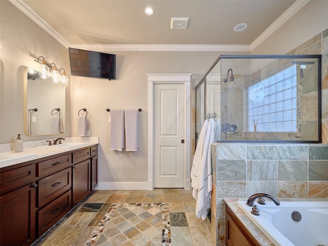 228 E Woodland St, Houston, TX 77009 - full bath with a stall shower, baseboards, ornamental molding, visible vents, and double vanity