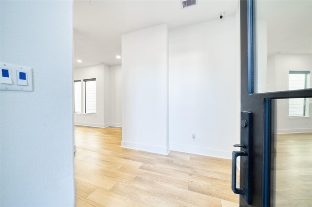 2420 Sumpter St, Houston, TX 77026 - interior space with recessed lighting, baseboards, visible vents, and light wood-style floors