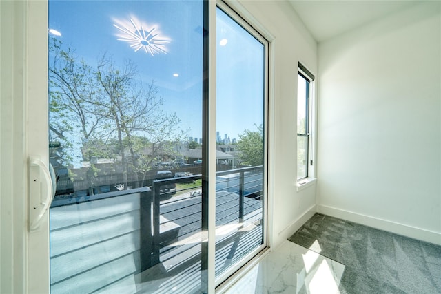 2420 Sumpter St, Houston, TX 77026 - doorway to outside with baseboards