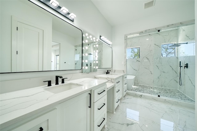 2420 Sumpter St, Houston, TX 77026 - bathroom featuring visible vents, marble finish floor, a marble finish shower, and vanity
