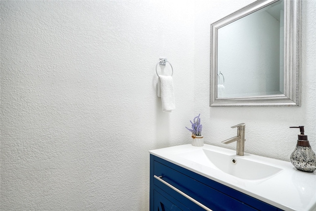10912 Gulf Fwy Unit 28, Houston, TX 77034 - bathroom featuring vanity and a textured wall