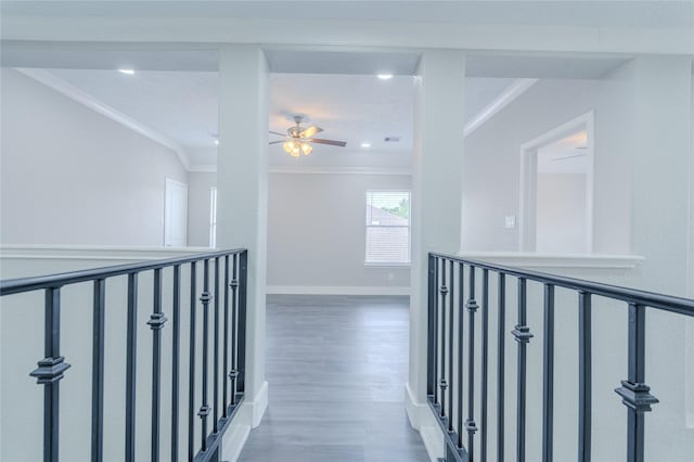 hallway featuring recessed lighting, visible vents, ornamental molding, and wood finished floors