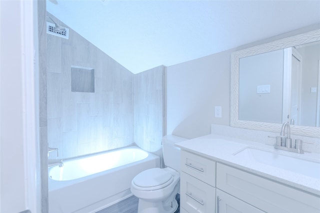 full bath featuring vanity, shower / bathtub combination, toilet, vaulted ceiling, and visible vents