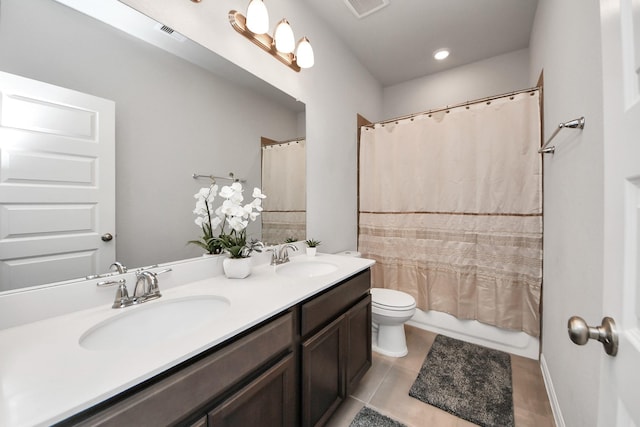 full bathroom featuring tile patterned flooring, a sink, visible vents, and toilet