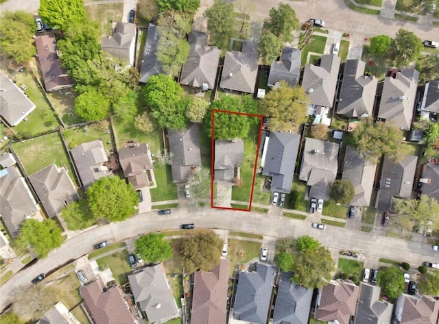 birds eye view of property with a residential view