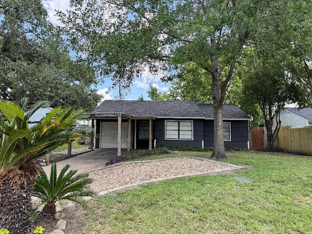 7006 Jalna St, Houston, TX 77055 - single story home featuring a garage, driveway, and roof with shingles