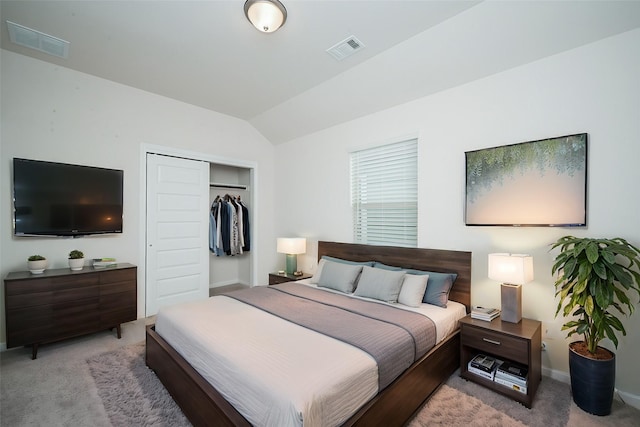 bedroom with visible vents, carpet floors, and lofted ceiling