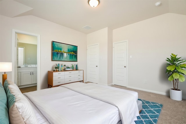 21807 Ash Cypress Ct, Cypress, TX 77433 - bedroom with lofted ceiling, carpet flooring, ensuite bath, baseboards, and a sink
