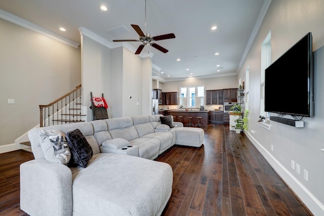 2125 Mcilhenny St, Houston, TX 77004 - living room with a ceiling fan, dark wood-style flooring, stairway, ornamental molding, and recessed lighting