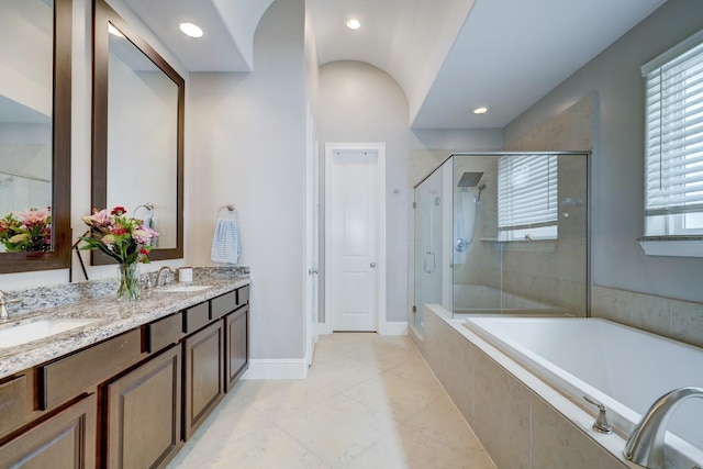 2125 Mcilhenny St, Houston, TX 77004 - bathroom with tile patterned flooring, a shower stall, a sink, and a garden tub