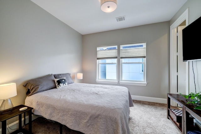 2125 Mcilhenny St, Houston, TX 77004 - bedroom with carpet floors, baseboards, and visible vents