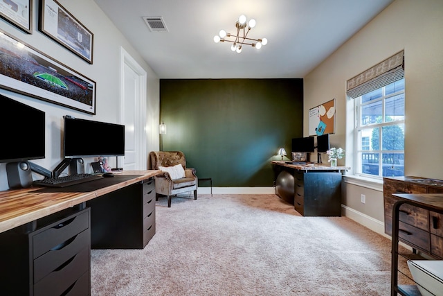 2125 Mcilhenny St, Houston, TX 77004 - office featuring an inviting chandelier, baseboards, light colored carpet, and visible vents