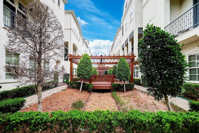 2125 Mcilhenny St, Houston, TX 77004 - view of home's community with a pergola and a wooden deck