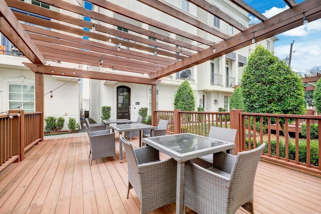 2125 Mcilhenny St, Houston, TX 77004 - wooden deck featuring outdoor dining area and a pergola