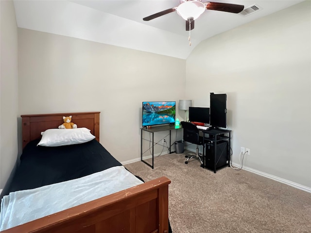 carpeted bedroom with visible vents, a ceiling fan, baseboards, and lofted ceiling