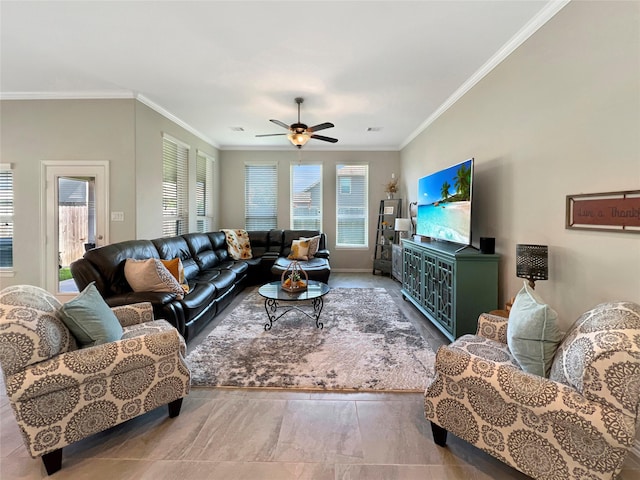 living room with crown molding, a ceiling fan, baseboards, and visible vents
