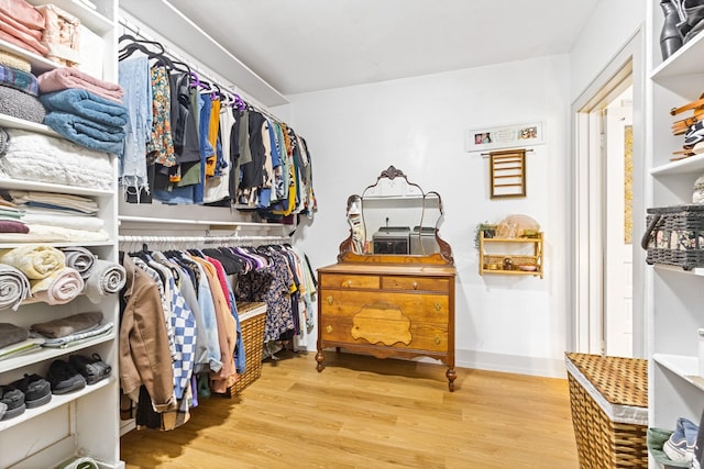 walk in closet featuring light wood-type flooring