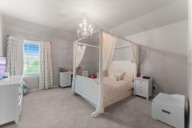 bedroom featuring baseboards, an inviting chandelier, and light carpet