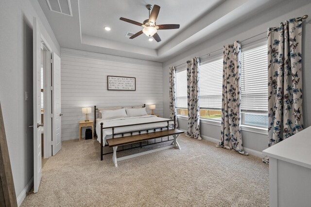 4381 Victoria Pine Dr, Spring, TX 77386 - bedroom featuring light carpet, a tray ceiling, recessed lighting, baseboards, and ceiling fan