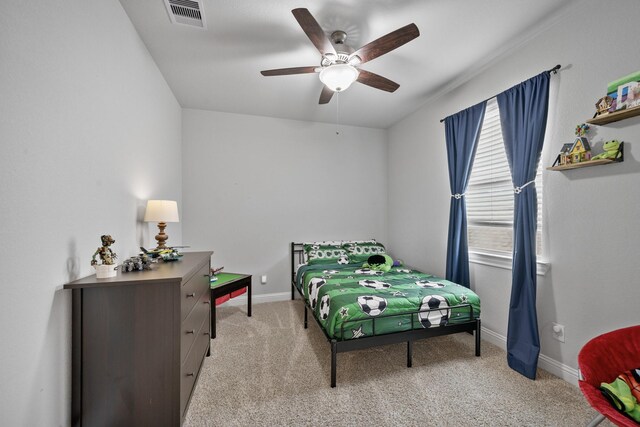 4381 Victoria Pine Dr, Spring, TX 77386 - carpeted bedroom with baseboards and a ceiling fan