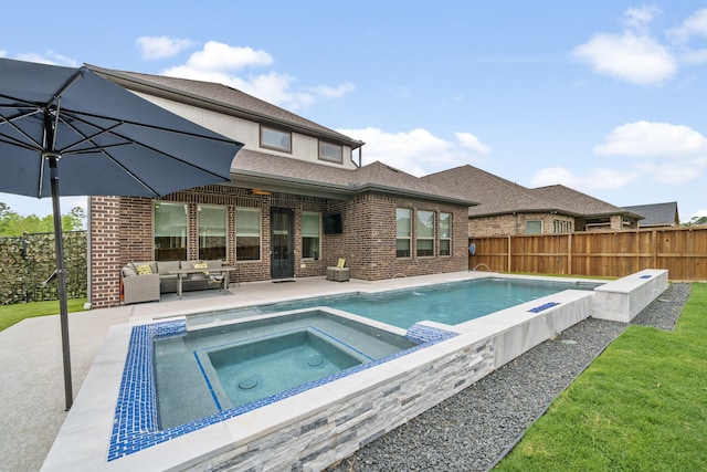 4381 Victoria Pine Dr, Spring, TX 77386 - view of swimming pool featuring an in-ground hot tub, outdoor lounge area, a fenced backyard, and a patio