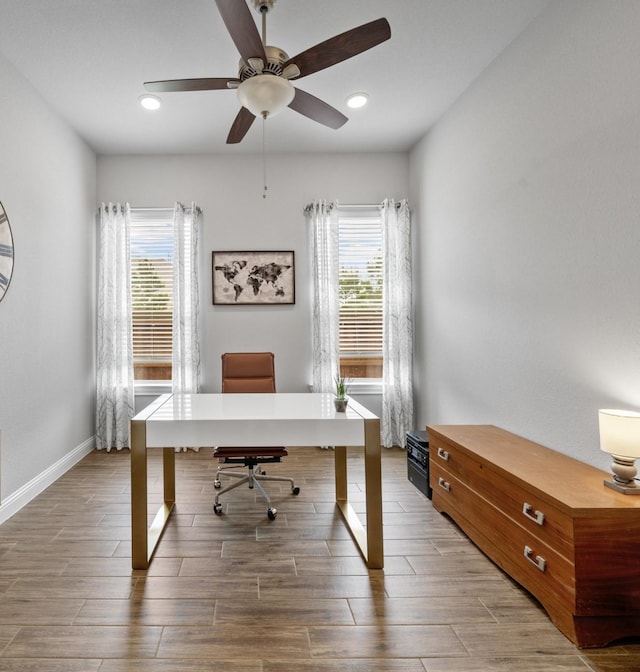 4381 Victoria Pine Dr, Spring, TX 77386 - home office with plenty of natural light, ceiling fan, wood finished floors, baseboards, and recessed lighting