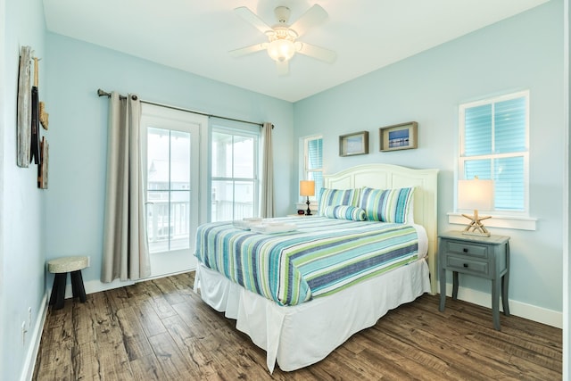bedroom featuring baseboards, ceiling fan, wood finished floors, and access to exterior