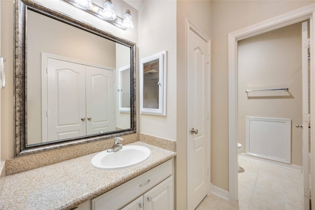 28202 Rippling Brook Ln, Fulshear, TX 77441 - bathroom with vanity, tile patterned floors, baseboards, and toilet