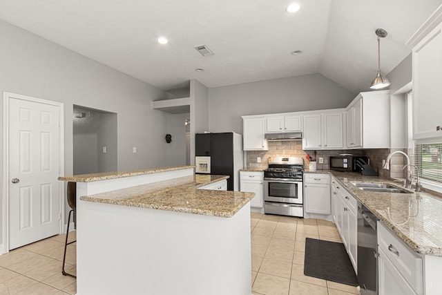 kitchen with visible vents, light tile patterned flooring, under cabinet range hood, a sink, and black appliances