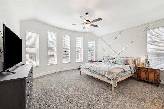 bedroom with light colored carpet, baseboards, vaulted ceiling, and multiple windows