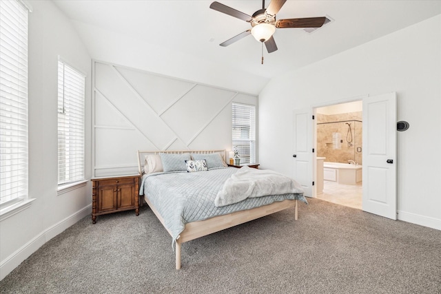 bedroom featuring light colored carpet, baseboards, vaulted ceiling, and multiple windows