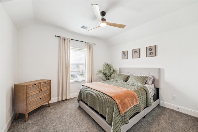 bedroom featuring visible vents, a ceiling fan, baseboards, carpet flooring, and vaulted ceiling