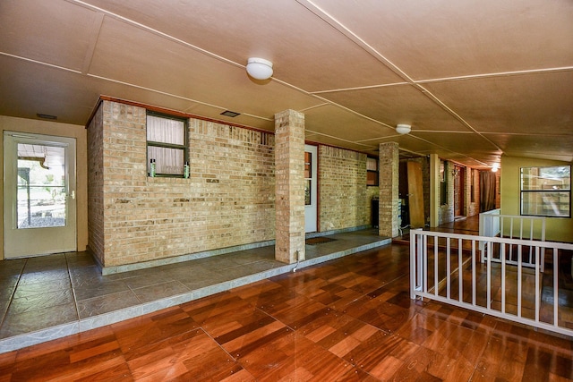 406 Hidden Creek Cir, Sealy, TX 77474 - empty room featuring brick wall