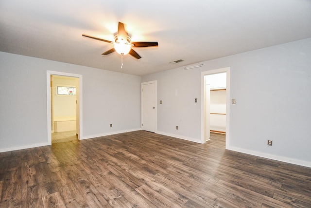 406 Hidden Creek Cir, Sealy, TX 77474 - empty room featuring a ceiling fan, wood finished floors, and baseboards