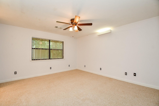 406 Hidden Creek Cir, Sealy, TX 77474 - spare room with ceiling fan, light colored carpet, and baseboards