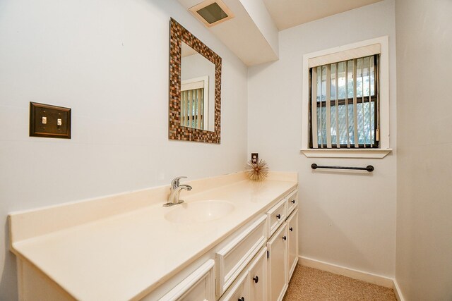 406 Hidden Creek Cir, Sealy, TX 77474 - bathroom featuring vanity and baseboards