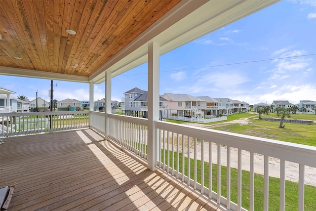 4042 Miramar Ct, Galveston, TX 77554 - wooden terrace featuring a residential view and a yard
