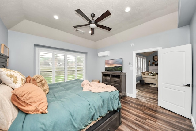 bedroom featuring recessed lighting, baseboards, dark wood-style flooring, and visible vents