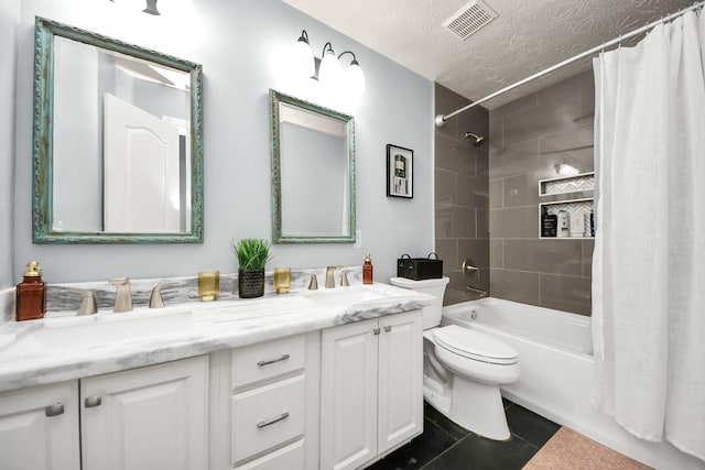 full bath featuring visible vents, double vanity, toilet, a sink, and shower / bath combo
