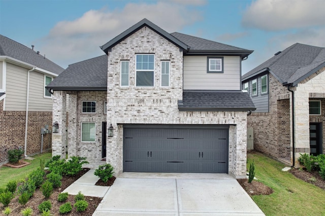 french country home featuring concrete driveway, an attached garage, and a shingled roof