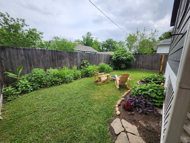 view of yard with a fenced backyard