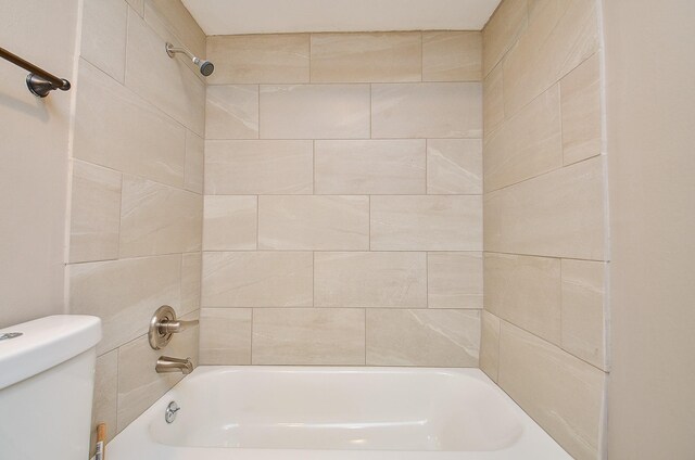 full bathroom featuring toilet and shower / bath combination