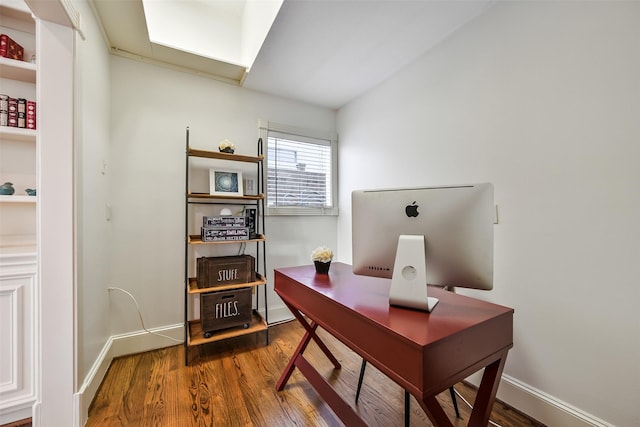 5217 Beech St, Bellaire, TX 77401 - home office with baseboards and wood finished floors