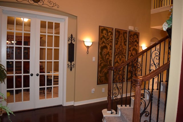 8807 Stowe Creek Ln, Missouri City, TX 77459 - entryway featuring french doors, baseboards, and stairs